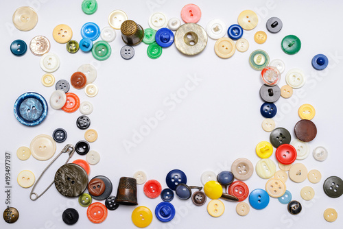 Buttons of different colors on a white background