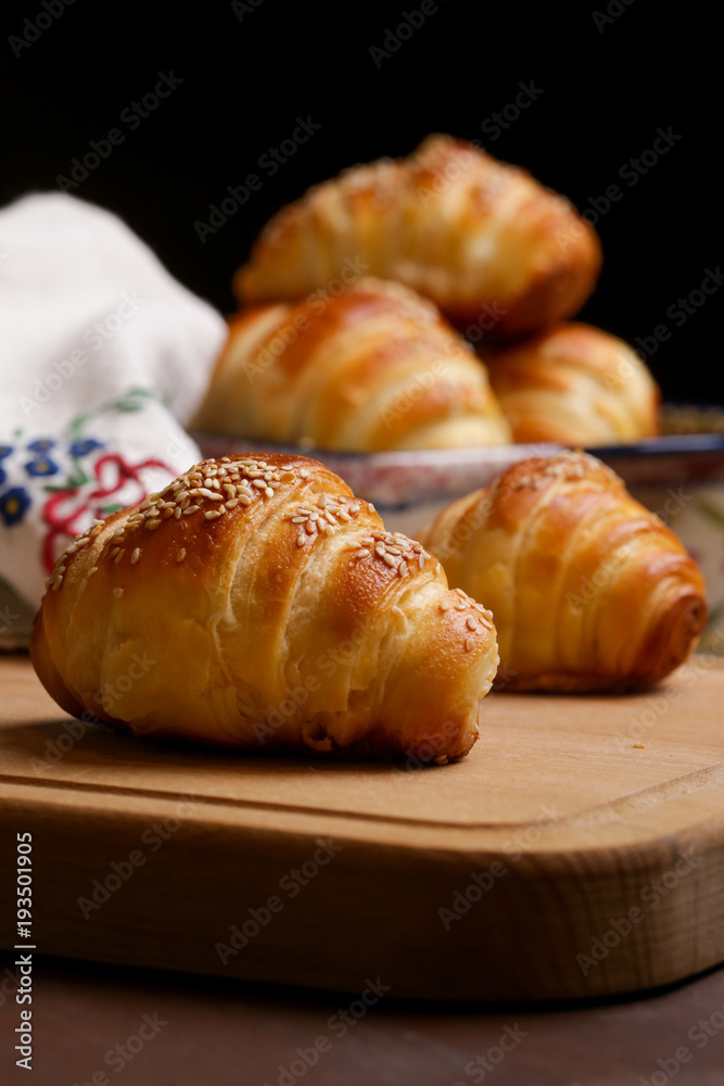 Freshly baked croissants on the table