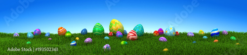 Photography Colorful Easter eggs on green grass with blue sky - 3d render