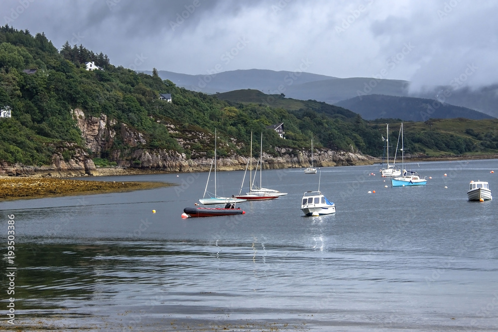 Obraz premium Beautiful scottish landscape. Ullapool harbour, Scotland, United Kingdom, August 2016.