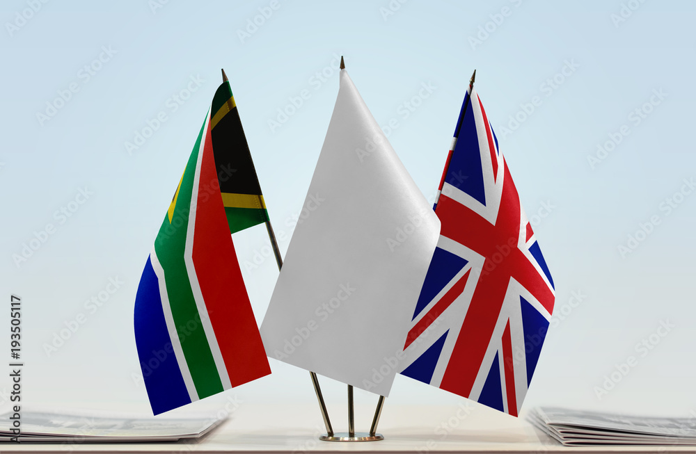 Flags of Republic of South Africa and United Kingdom with a white flag in the middle