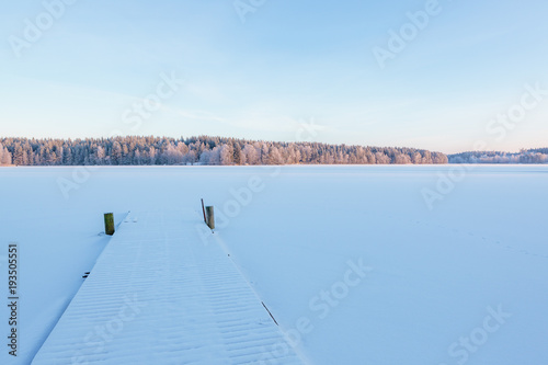 Fototapeta Naklejka Na Ścianę i Meble -  Winter lake scenery in finland at evening