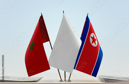 Flags of Morocco and North Korea with a white flag in the middle