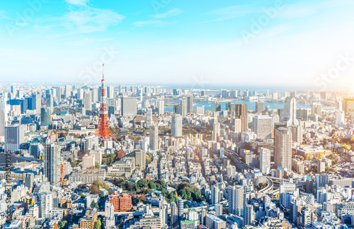 Asia Business concept for real estate and corporate construction - panoramic modern city skyline bird eye aerial view of tokyo tower and odaiba under blue sky in Roppongi Hill, Tokyo, Japan