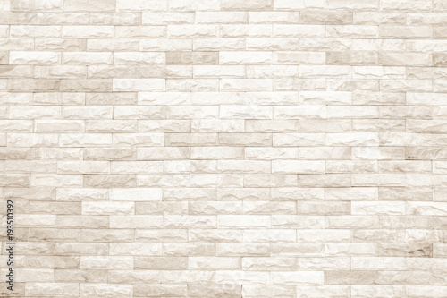 Cream and white brick wall texture background or wallpaper abstract paint to flooring and homework.