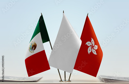 Flags of Mexico and Hong Kong with a white flag in the middle