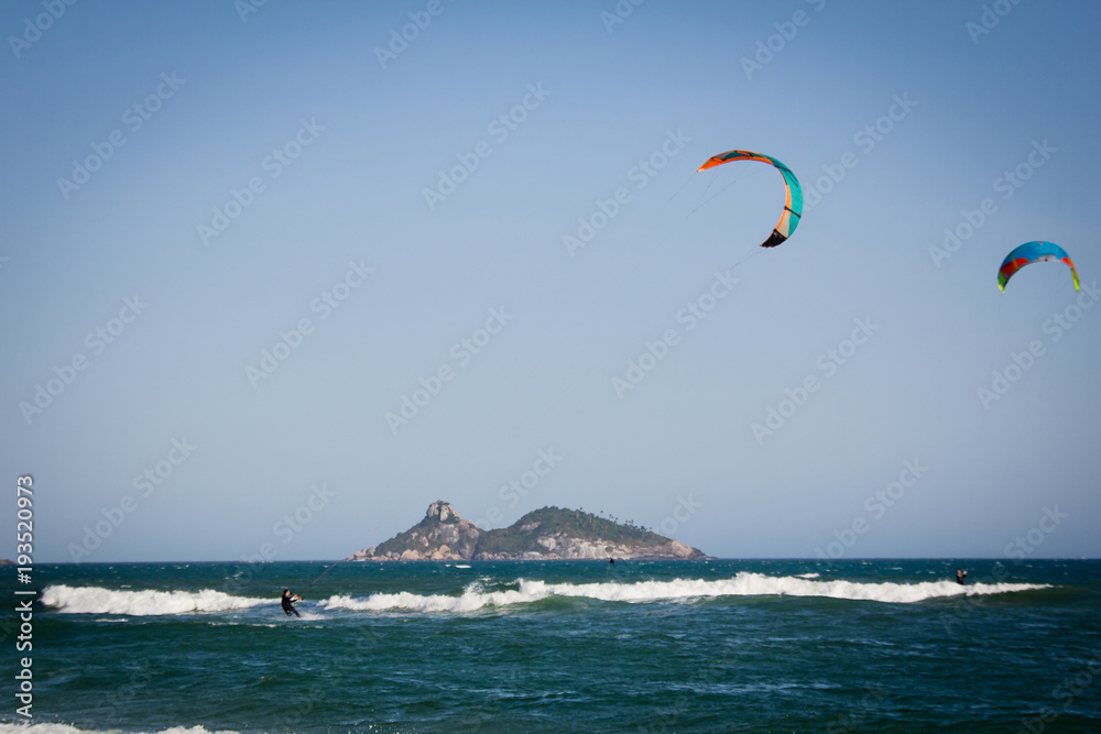 Kitesurfers in action in Barra da Tijuca Beach, Rio de Janeiro Kitesurfers in action in Barra da Tijuca Beach, Rio de Janeiro