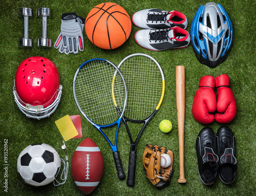 Various Sport Equipments On Grass © Andrey Popov