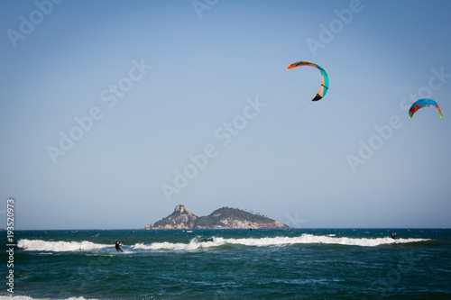Kitesurfers in action in Barra da Tijuca Beach, Rio de Janeiro