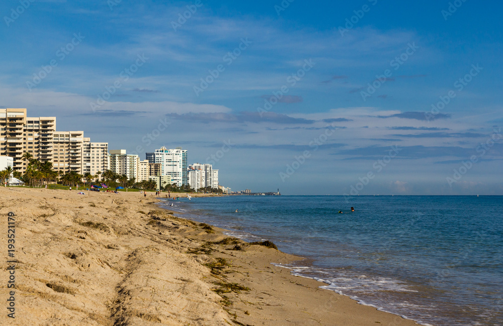 Pompano Beach in Florida, with condominium buildings and Hillsboro Inlet lighthouse Pompano Beach in Florida, with condominium buildings and Hillsboro Inlet lighthouse