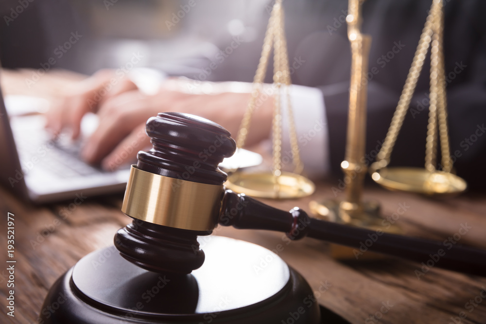 Close-up Of Gavel And Justice Scale Close-up Of Gavel And Justice Scale