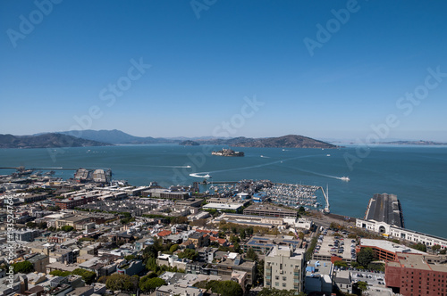 View of Alcatraz Island and famous Pier 39 from Coit Tower in San Francisco
