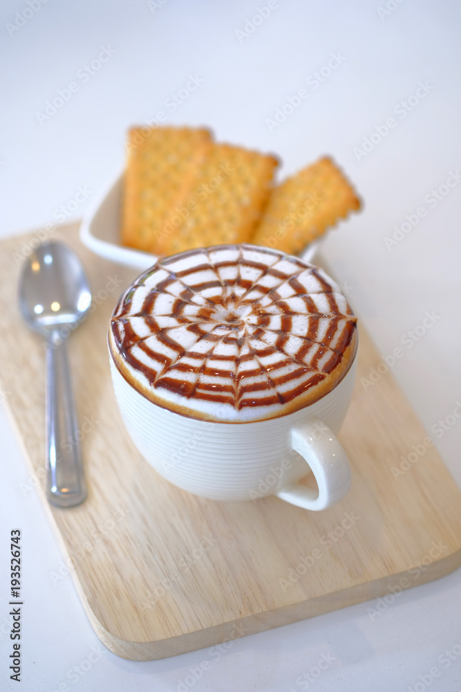 Hot coffee decorated with caramel macchiato served , Macchiato coffee, Latte art, Hot beverage with caramel syrup, Hot coffee decorated with caramel macchiato served , Macchiato coffee, Latte art, Hot beverage with caramel syrup,