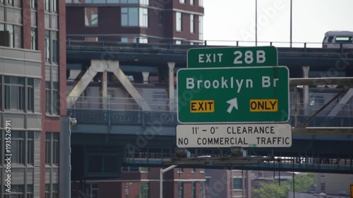 Brooklyn Bridge Sign With Subway Train NYC photo