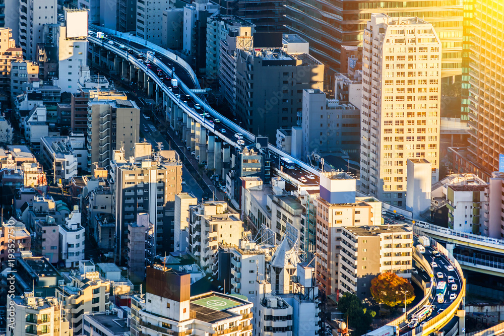 Asia Business concept for real estate and corporate construction - panoramic modern city skyline bird eye aerial view of Odaiba & Tokyo Metropolitan Expressway junction in Roppongi Hill, Tokyo, Japan