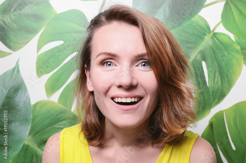 Portrait of smiling woman a...