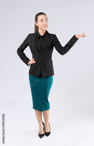 Beautiful young woman in el...