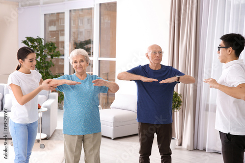Senior people doing exercis...