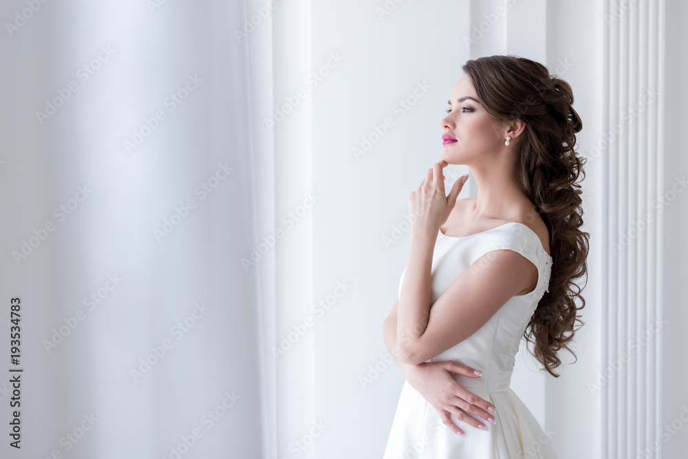 thoughtful young bride in wedding dress thoughtful young bride in wedding dress