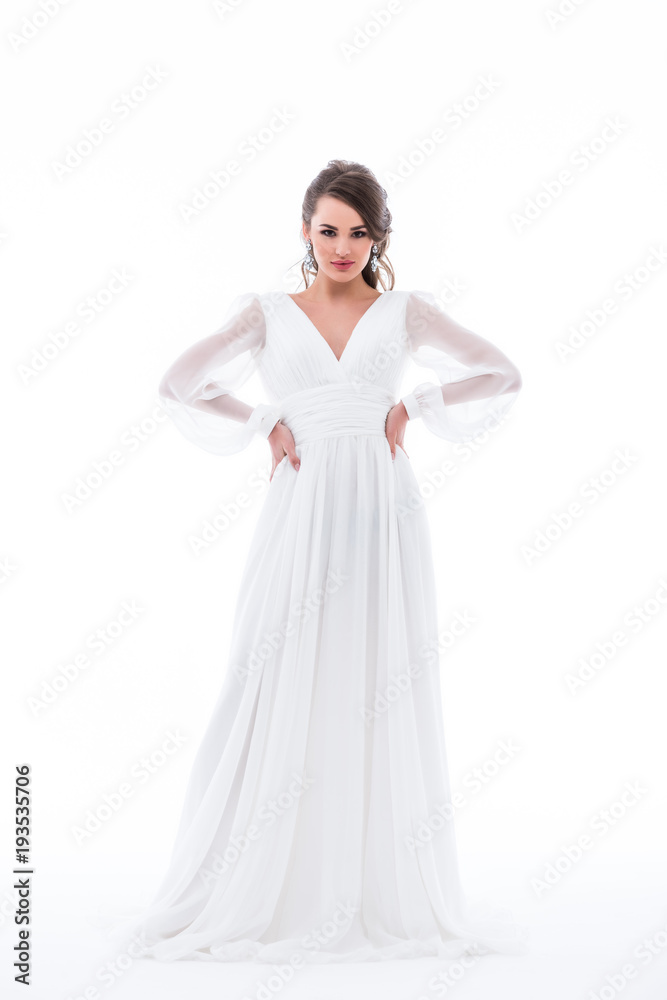 attractive bride posing in traditional wedding dress, isolated on white attractive bride posing in traditional wedding dress, isolated on white