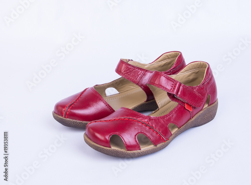 shoe or red colour woman shoes on background.