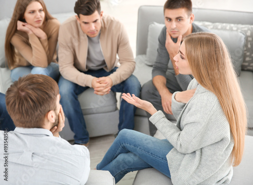 Young people during group therapy, indoors