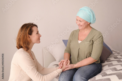 Young woman visiting her mo...