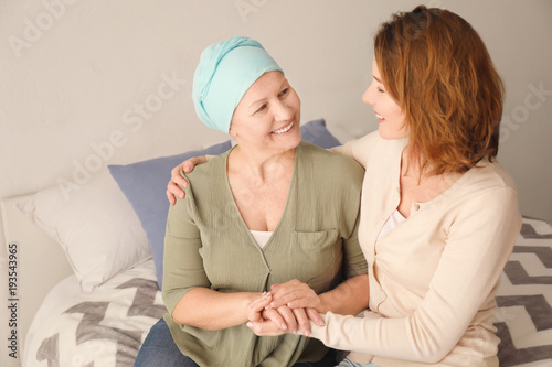 Young woman visiting her mo...