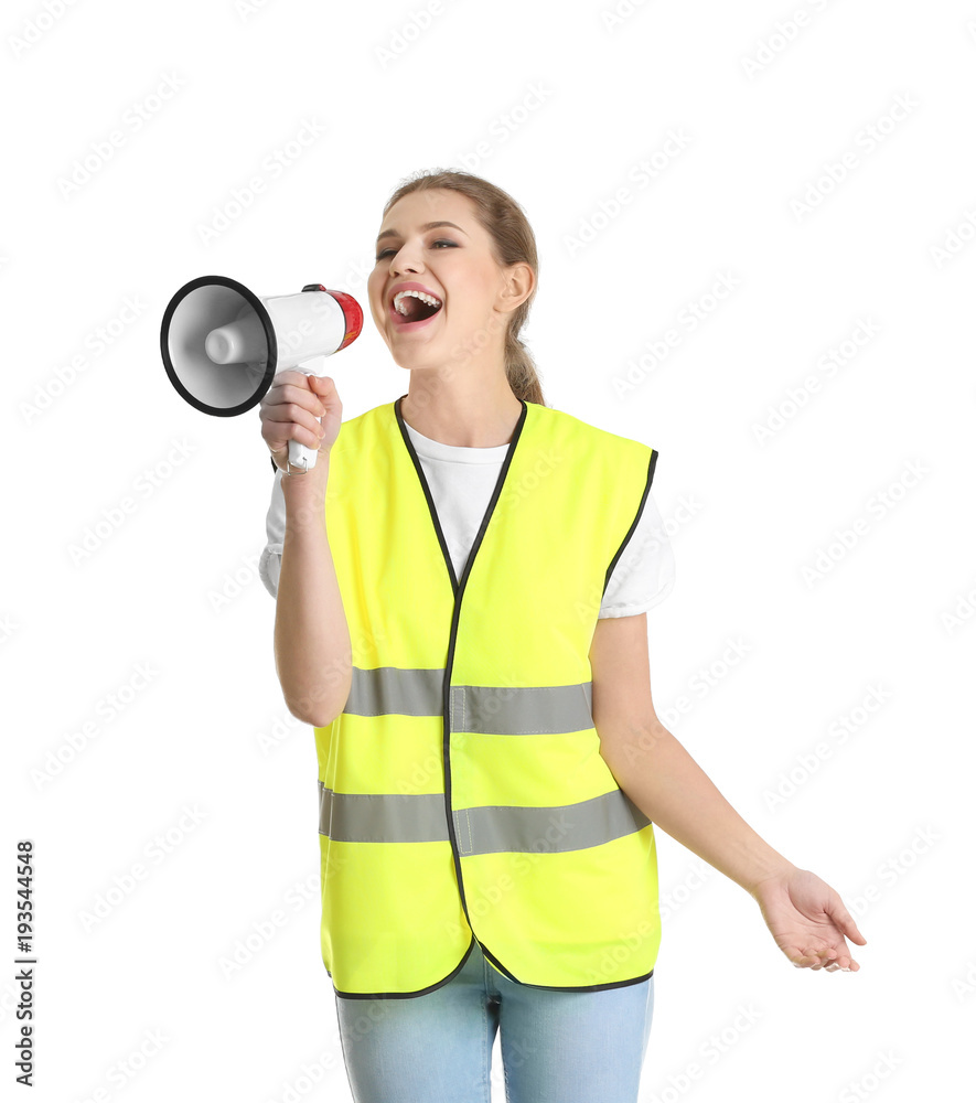Young woman in reflective vest with megaphone on white background Young woman in reflective vest with megaphone on white background