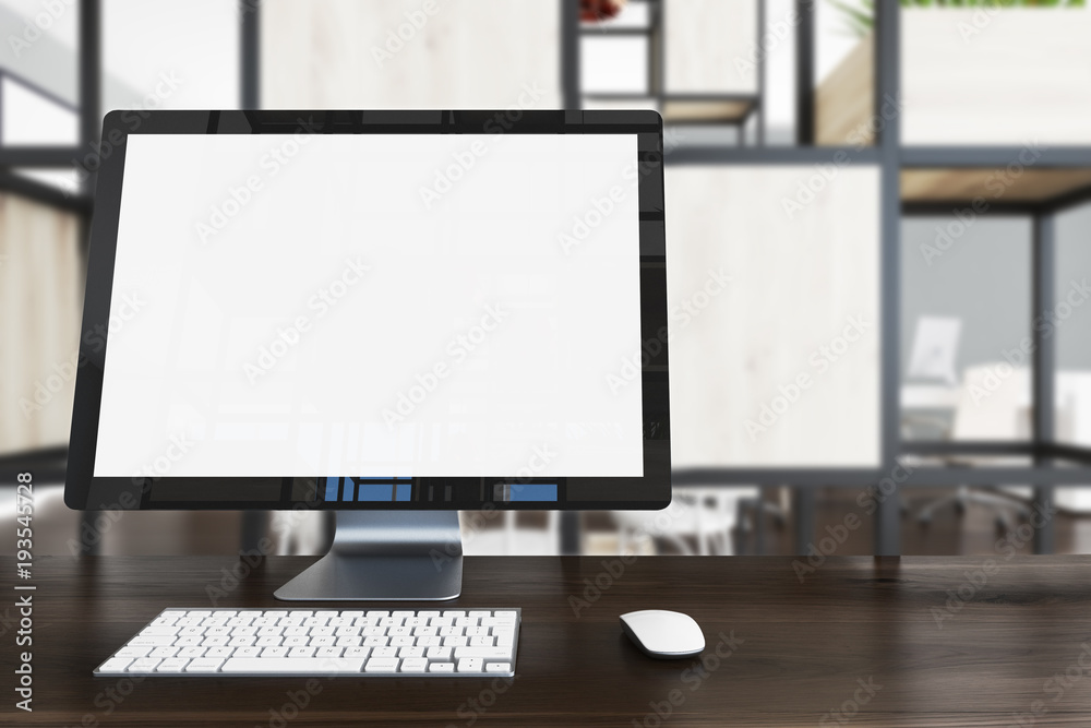 Blank computer screen on dark wooden table Blank computer screen on dark wooden table