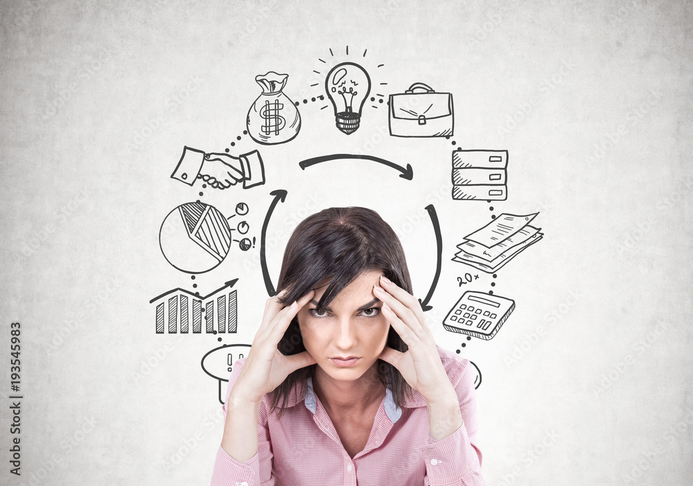 Fototapeta premium Stressed young brunette sitting, business strategy