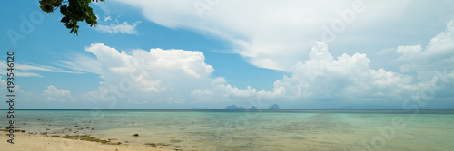 Fototapeta Naklejka Na Ścianę i Meble -  Panoramic sea landscape with clouds on horizon, shot from small tropical island, Thailand.
