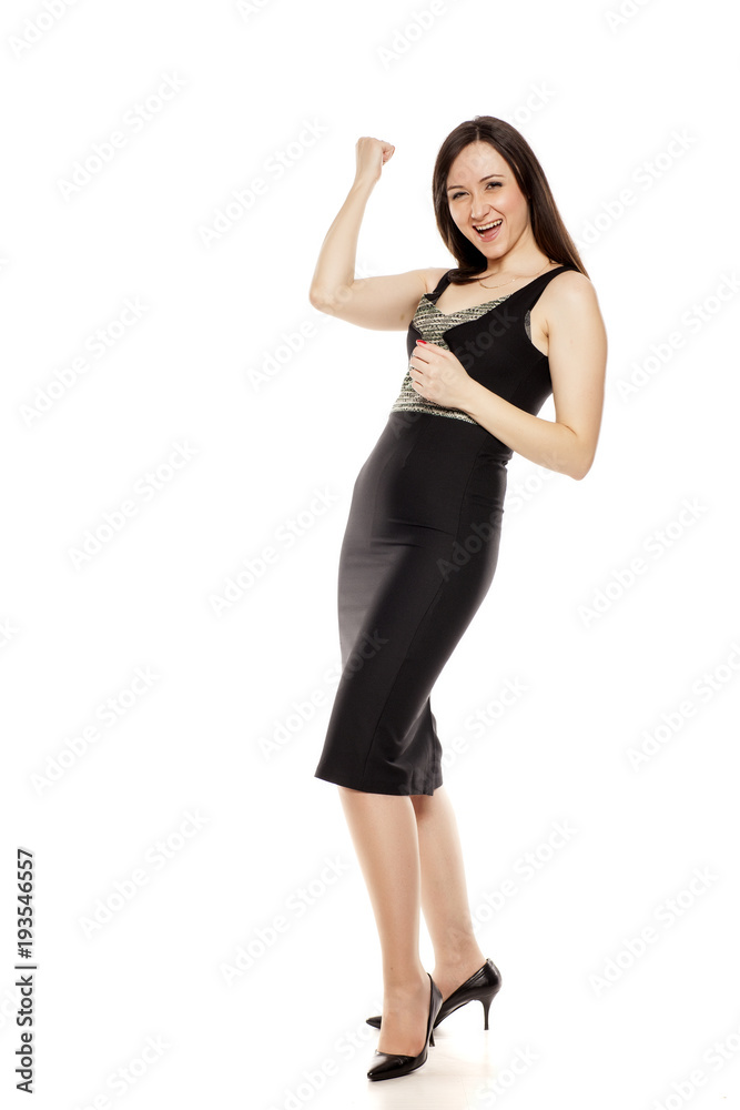 Happy businesswoman with winning gesture on white background Happy businesswoman with winning gesture on white background