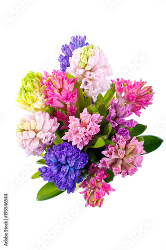 Lilac, blue, pink, raspberry hyacinths in a small, low bouquet. A holiday, a gift for a woman. Smart. View from above. Isolated