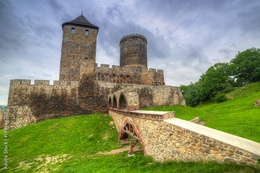 Medieval castle in Bedzin at dusk, Poland