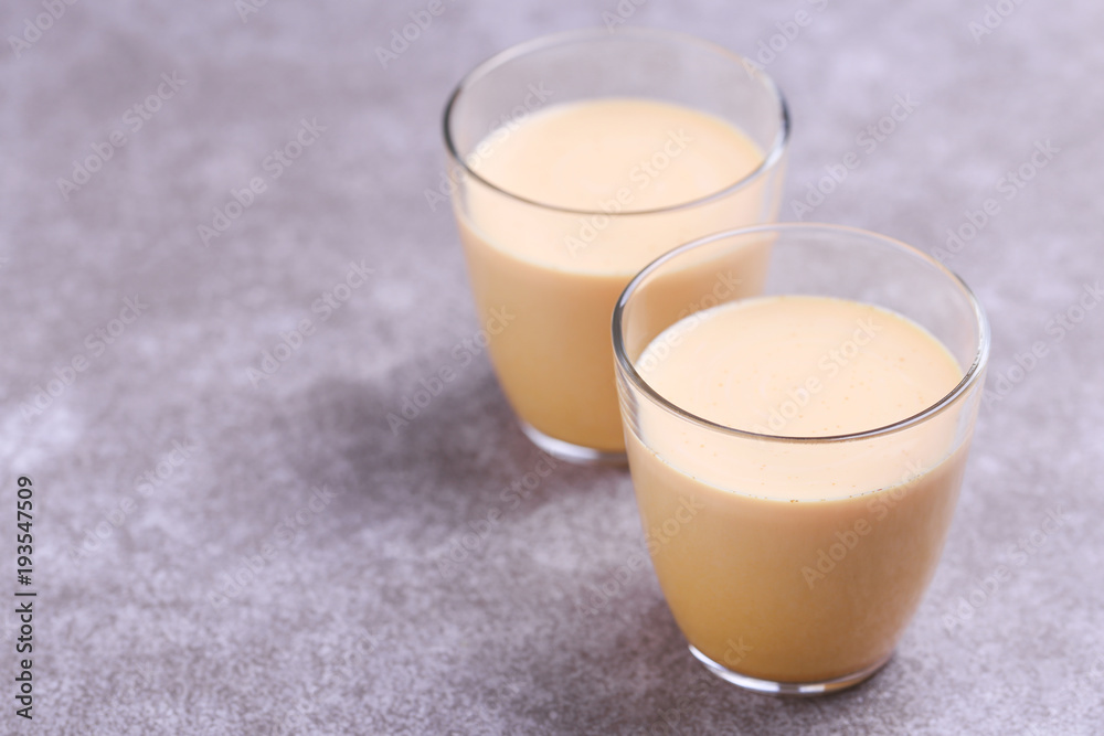Indian turmeric milk with saffron, cardamom and turmeric. Copyspace Indian turmeric milk with saffron, cardamom and turmeric. Copyspace
