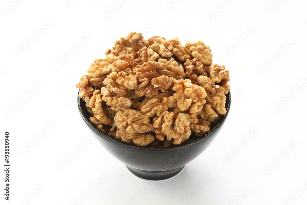 Walnuts pile isolated on white background. Walnuts pile isolated on white background.