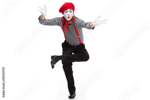 funny mime performing and gesturing isolated on white