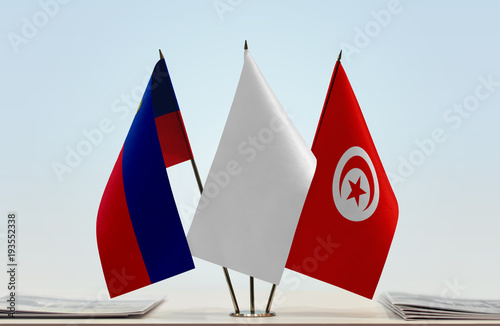 Flags of Liechtenstein and Tunisia with a white flag in the middle