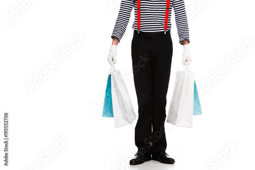 cropped image of mime standing with shopping bags isolated on white