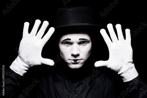 Schilderij op canvas mime showing hands isolated on black