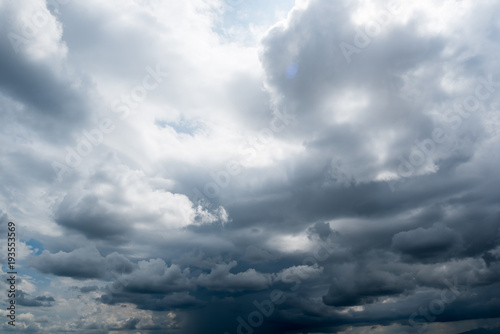dark storm clouds with background,Dark clouds before a thunder-storm. © pinglabel