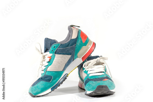 Beautiful fashion running shoes over white background.