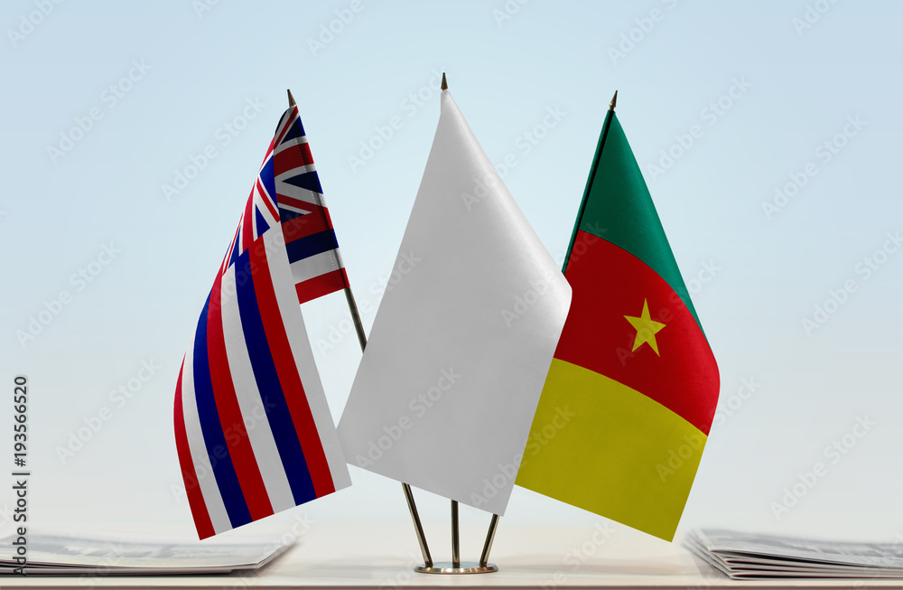 Flags of Hawaii and Cameroon with a white flag in the middle