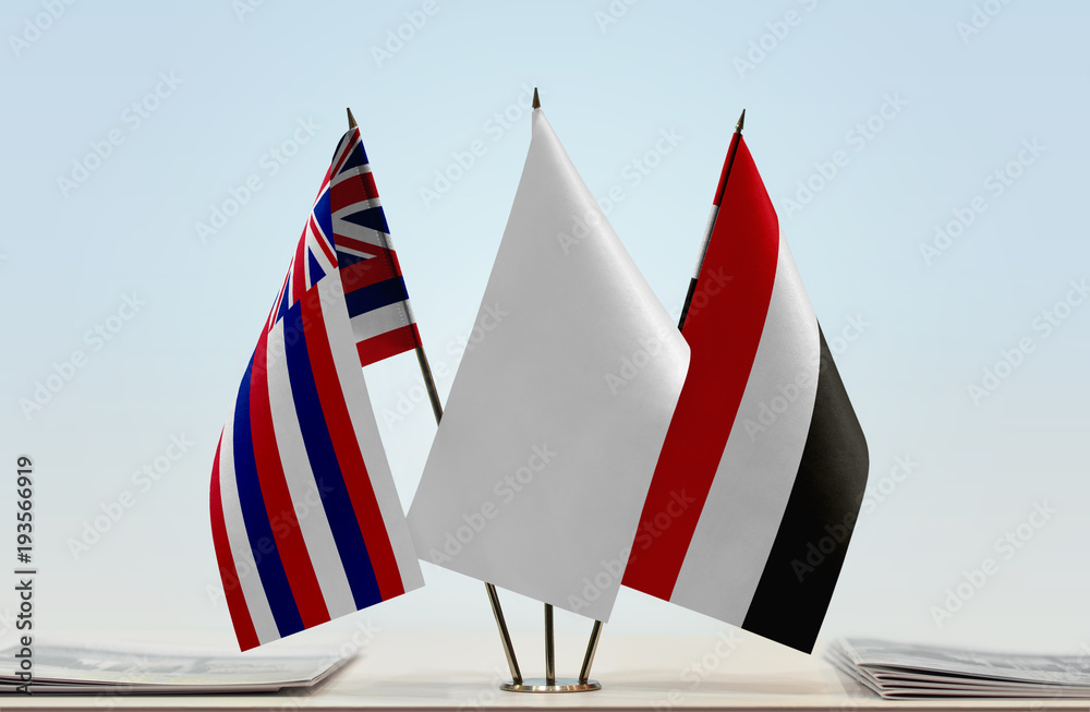 Flags of Hawaii and Yemen with a white flag in the middle