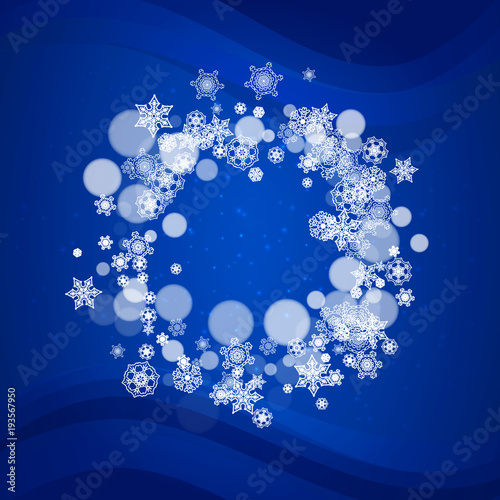 Snowflakes frame on blue background with sparkles. Merry Christmas and Happy New Year. Falling snowflakes frame for banners  gift cards  party invitation  partner compliment and special business offer