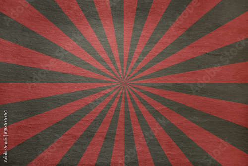 Red and grey slate background - with retro starburst in alternating stripes - abstract aged stone background