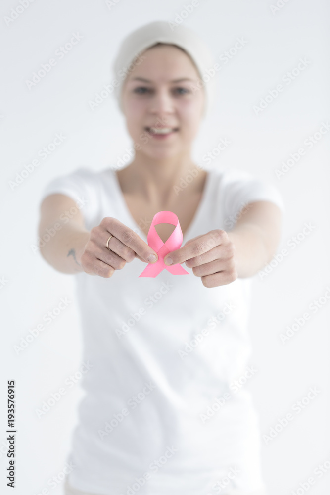 Pink ribbon of smiling survivor Pink ribbon of smiling survivor