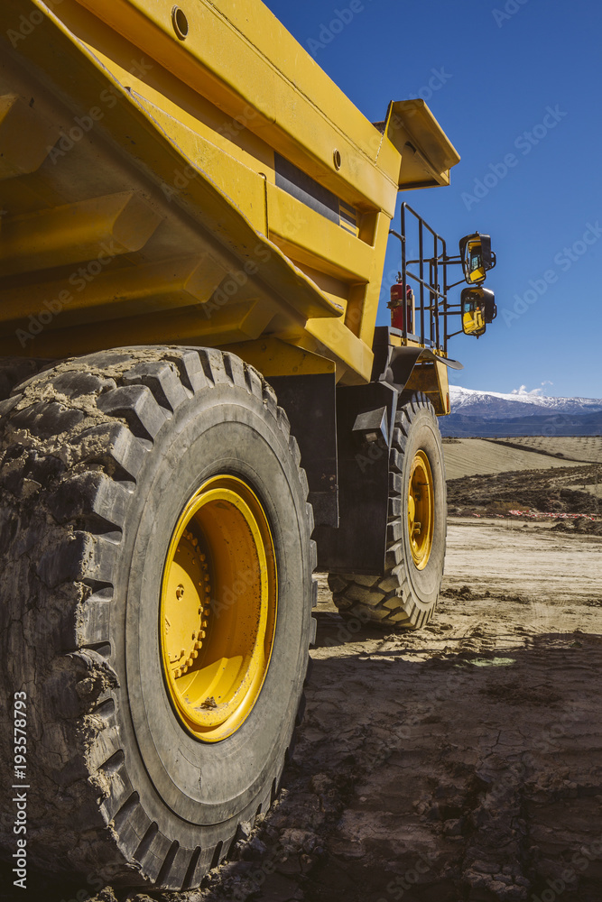 Fototapeta premium Dumper trucks parked on a construction site.