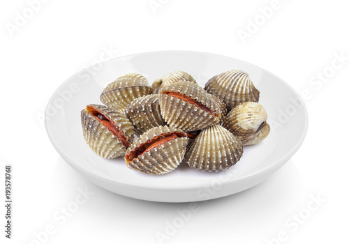 fresh cockles in plate on white background